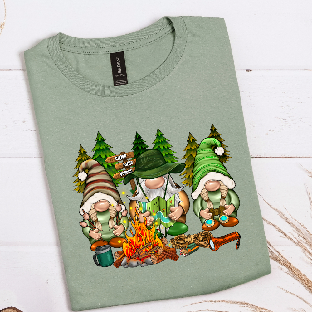 Camping Gnomes graphic T-shirt featuring camping gnome design on sage green shirt