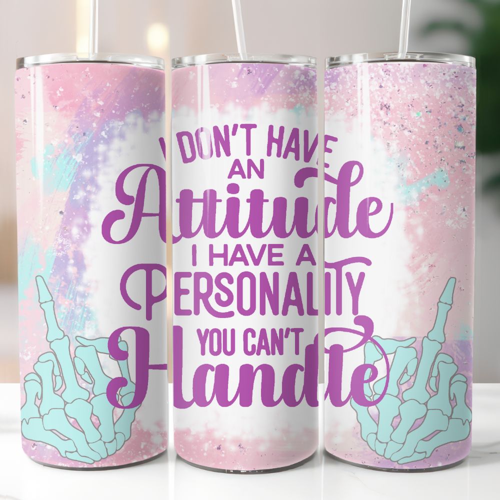 20 oz tumbler with pastel galaxy background, mint skeleton hands, and purple quote “I don’t have an attitude, I have a personality you can’t handle”
