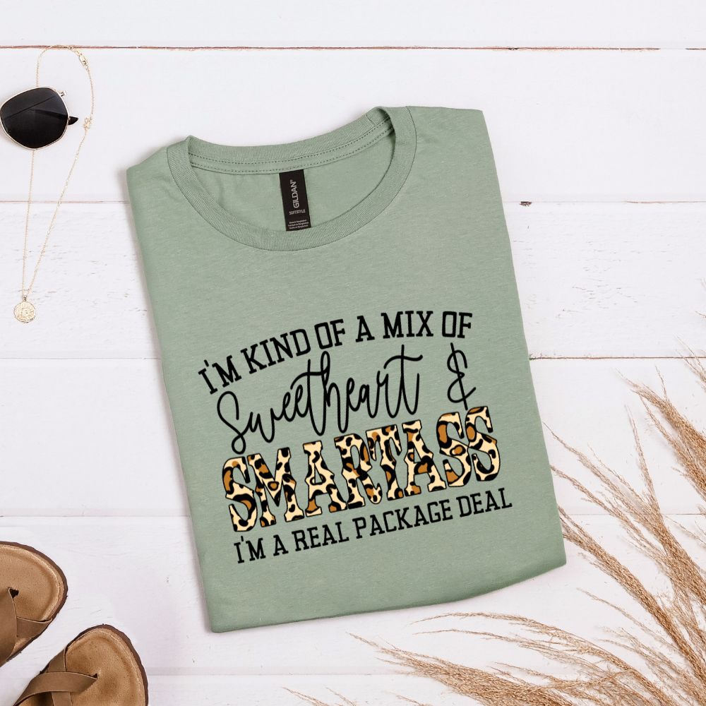 Sage green T-shirt with leopard and black text saying “Sweetheart & Smartass – I’m a real package deal”