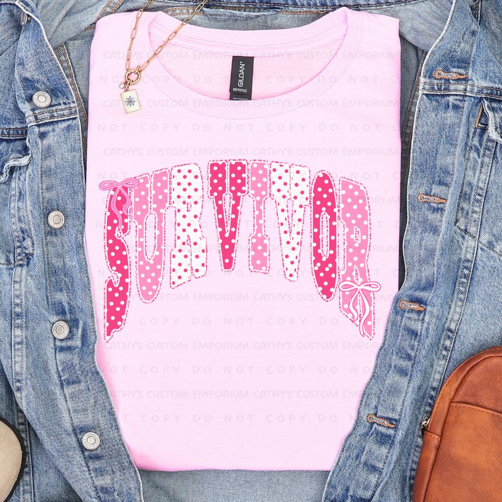 Light pink shirt featuring the word Survivor in pink and white polka-dot lettering with delicate bow accents for breast cancer awareness.