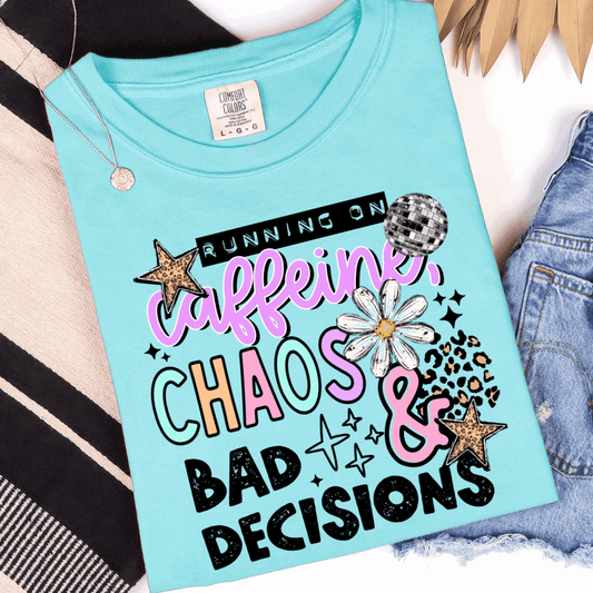 Comfort Colors Chalky Mint graphic T-shirt with Running on Caffeine Chaos and Bad Decisions design, styled with jeans and accessories.