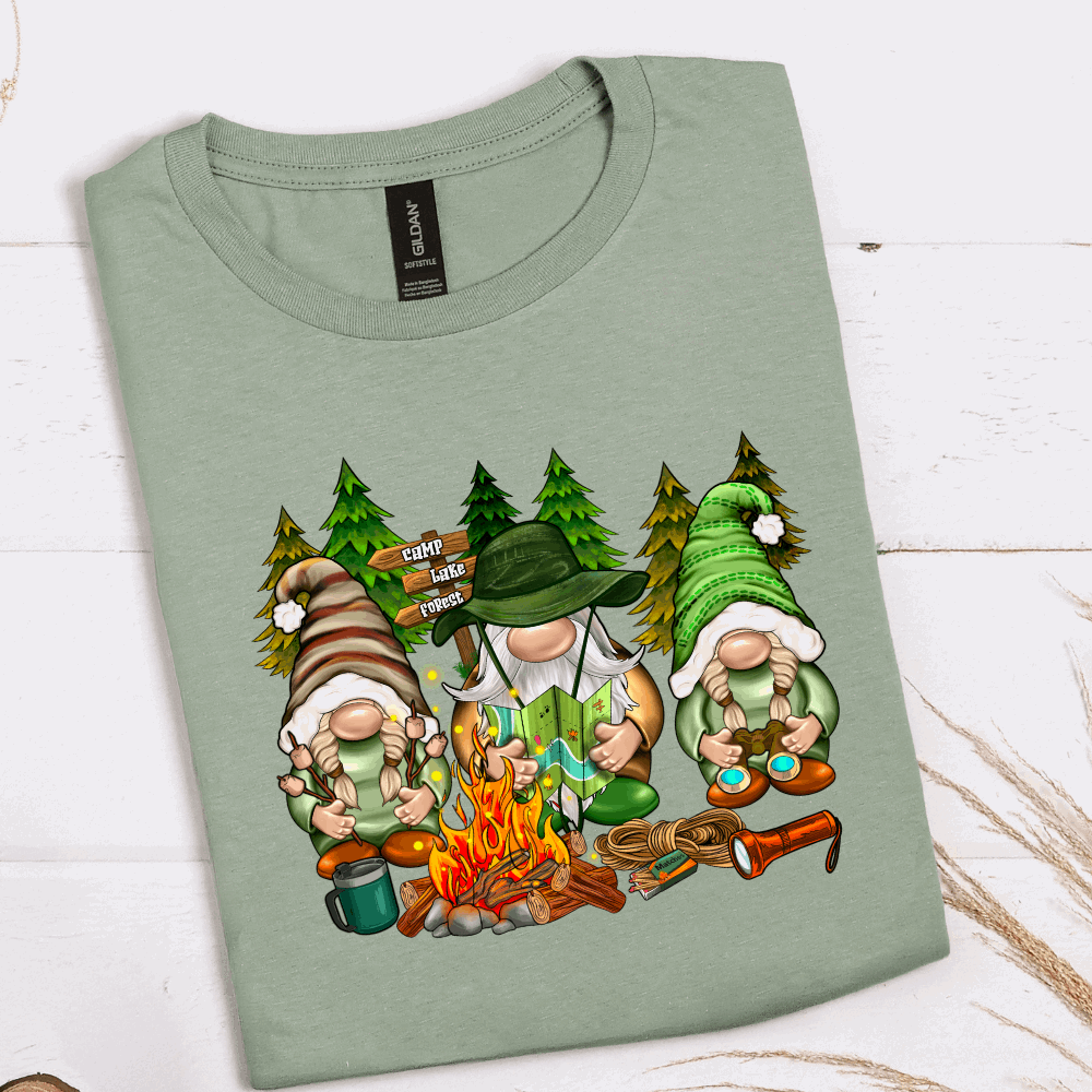 Camping Gnomes graphic T-shirt featuring camping gnome design on sage green shirt