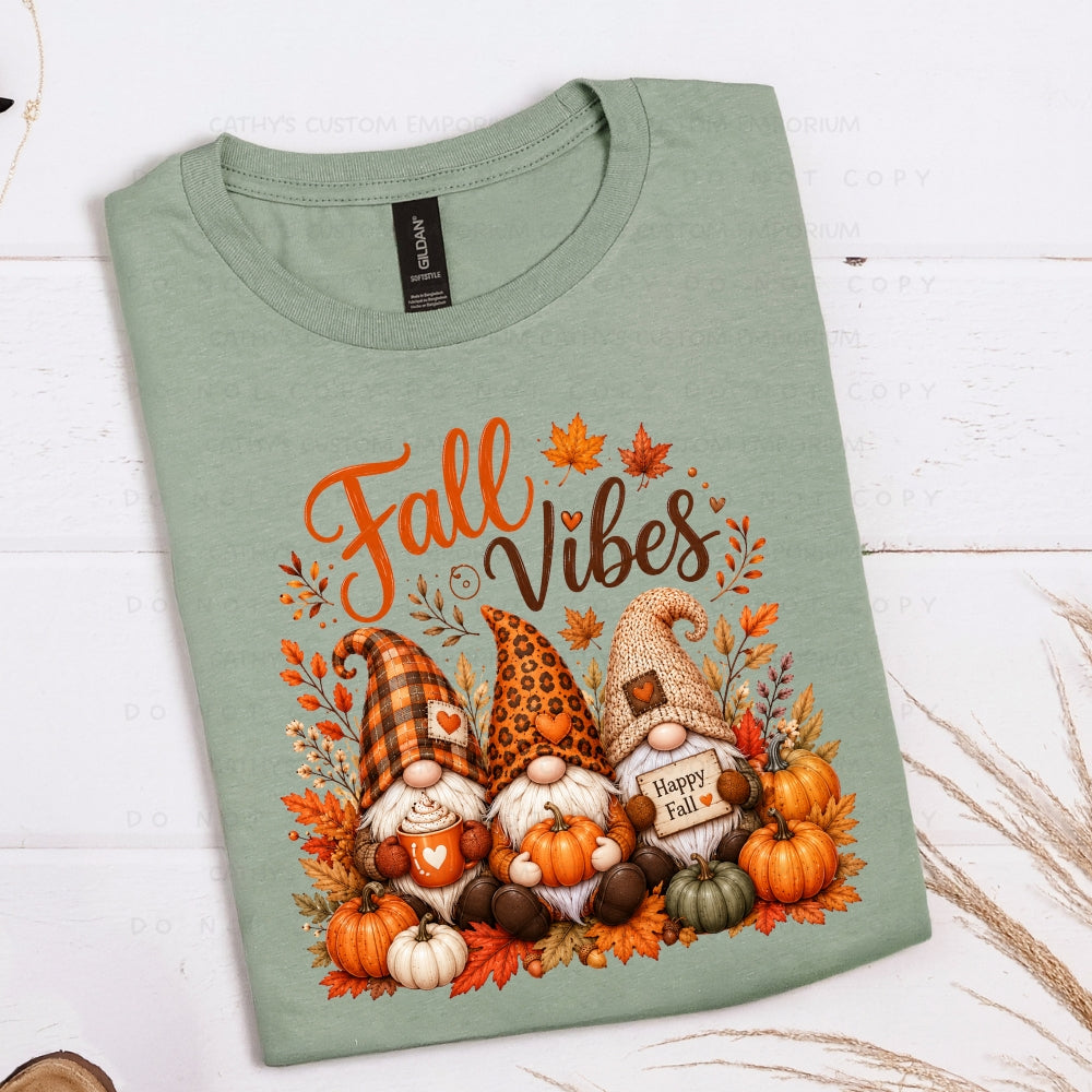 Fall Vibes graphic with three autumn gnomes, pumpkins, and leaves