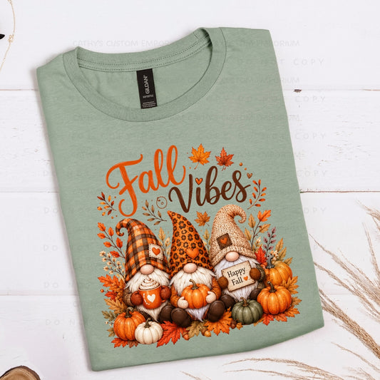 Fall Vibes graphic with three autumn gnomes, pumpkins, and leaves