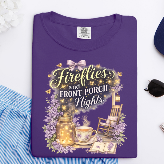Purple t-shirt with 'Fireflies and Front Porch Nights' design on a white background