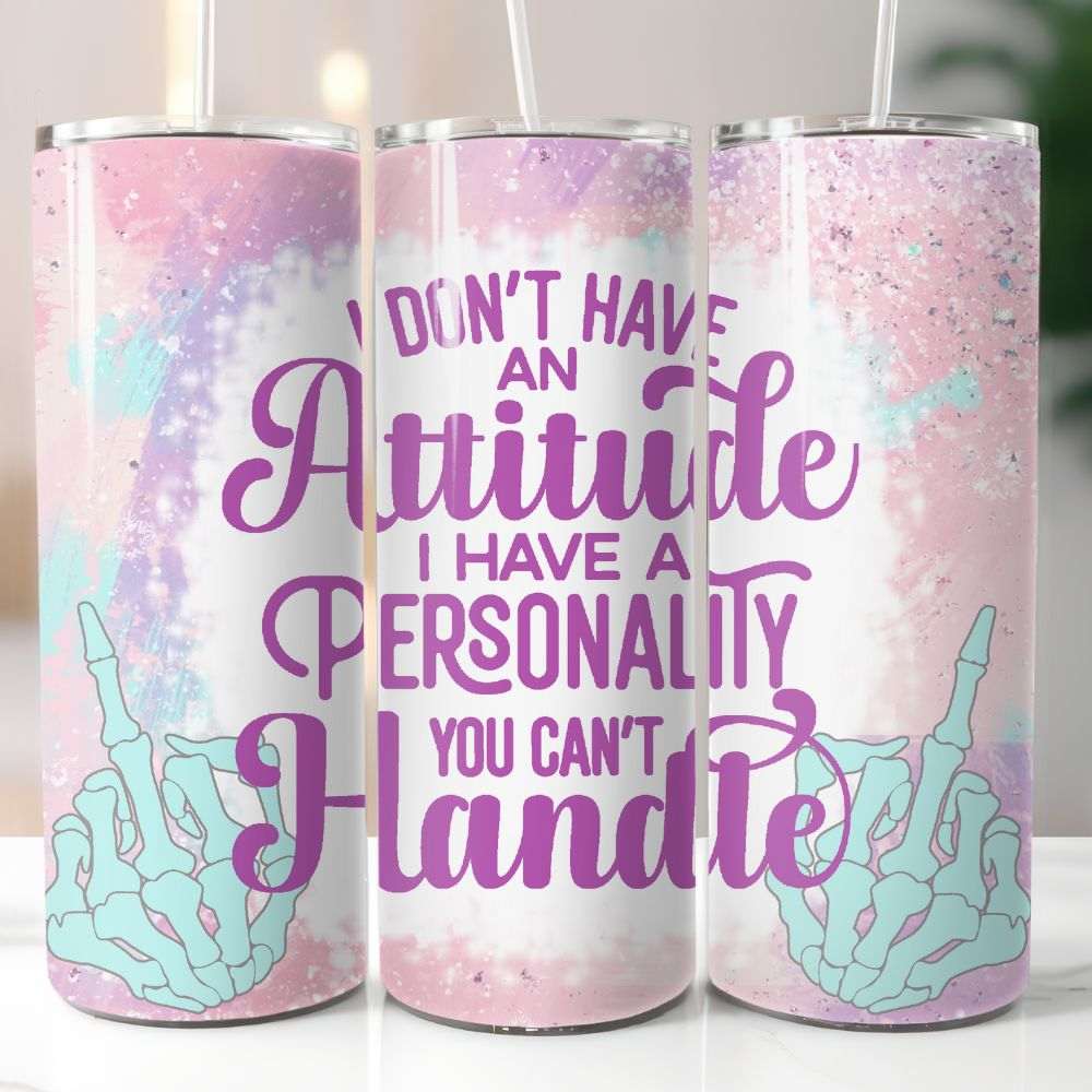  20 oz tumbler with pastel galaxy background, mint skeleton hands, and purple quote “I don’t have an attitude, I have a personality you can’t handle”