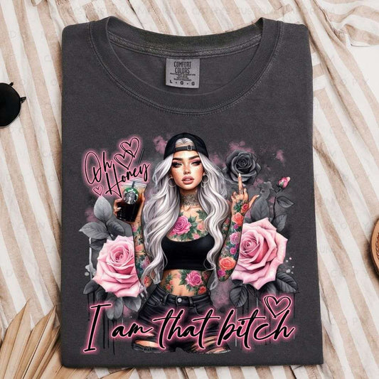 Black t-shirt with a graphic design of a woman with tattoos, roses, and text on a striped fabric background.