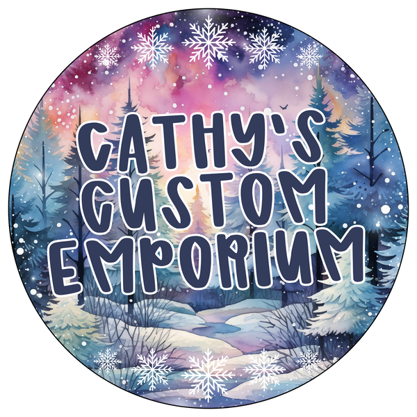 Circular design with winter landscape and 'Cathy's Custom Emporium' text