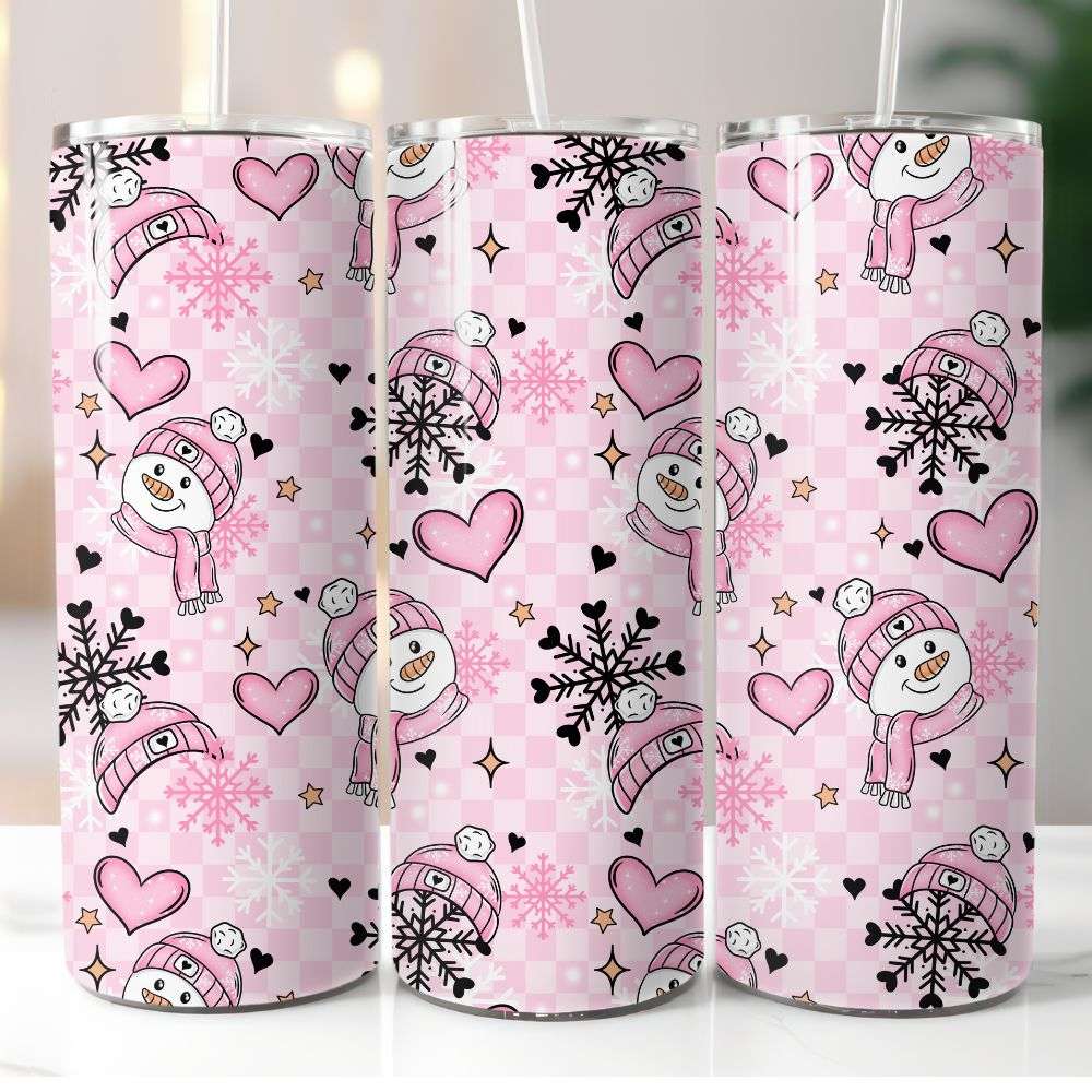 Pink tumbler with snowman and heart pattern.