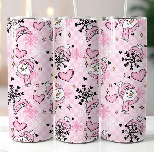 Pink tumbler with snowman and heart pattern.