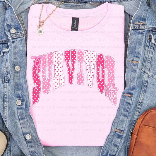 Light pink shirt featuring the word Survivor in pink and white polka-dot lettering with delicate bow accents for breast cancer awareness.