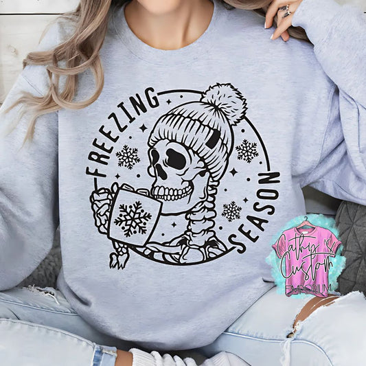 Freezing Season Sweatshirt with skull and mug design black ink on grey