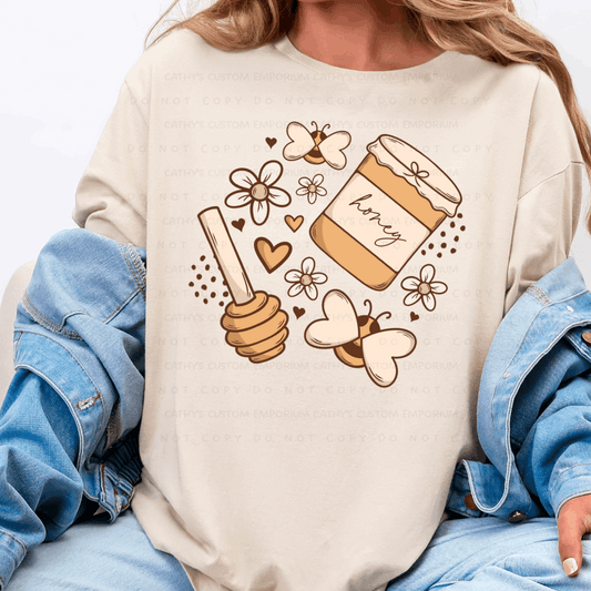 beige graphic T-shirt with honey jar dipper bees flowers and heart design