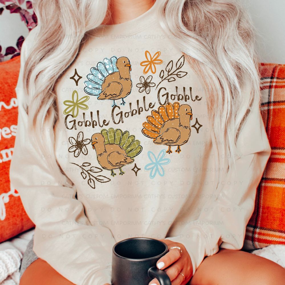 Retro Gobble Gobble turkey Thanksgiving graphic sweatshirt with colorful floral accents